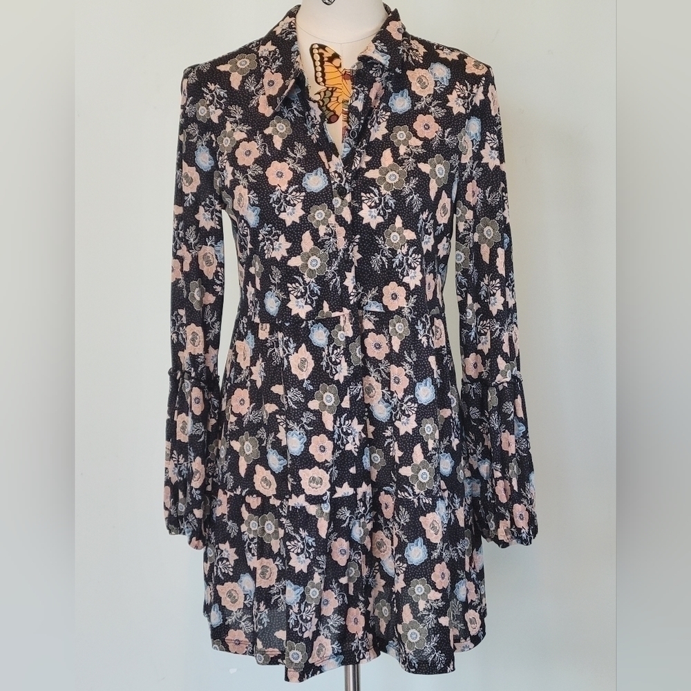 STYLE & CO long sleeved button down shirt.  Long lenth Size is Medium.